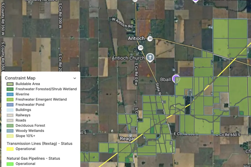 A high-resolution PVcase Prospect user interface screenshot displaying an advanced GIS constraint map layered over a colored satellite image of an area in the United States. The central map workspace visualizes individual land parcel boundaries overlaid with an automated buildable area analysis. A detailed map legend on the side displays color-coded environmental and civil hazard constraints, including freshwater pond, forested wetland, riverine, freshwater emergent wetland, deciduous forest, and woody wetlands. The screenshot displays additional active data infrastructure layers, highlighting a ten percent plus slope tolerance boundary, buildings, operational railways, operational roads, operational transmission lines, operational natural gas pipelines, and operational refined product pipelines intersecting the prospective parcels.