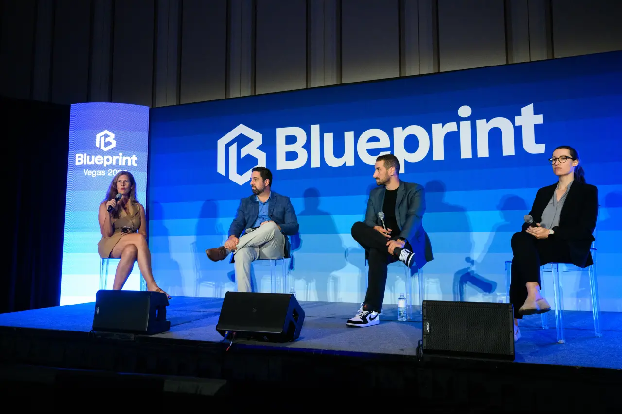 Photography of the Blueprint real estate conference panel