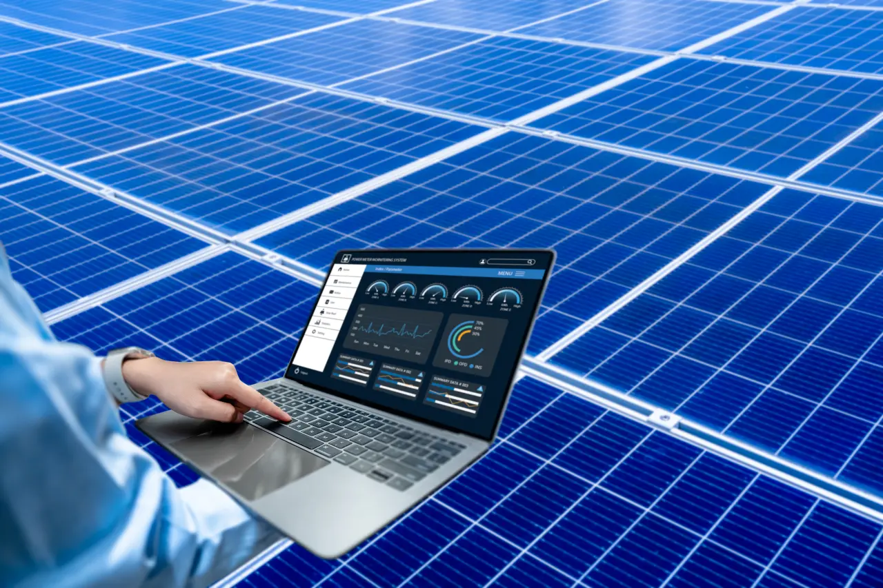 Abstract, photorealistic depiction of a solar panel monitoring software on a laptop.