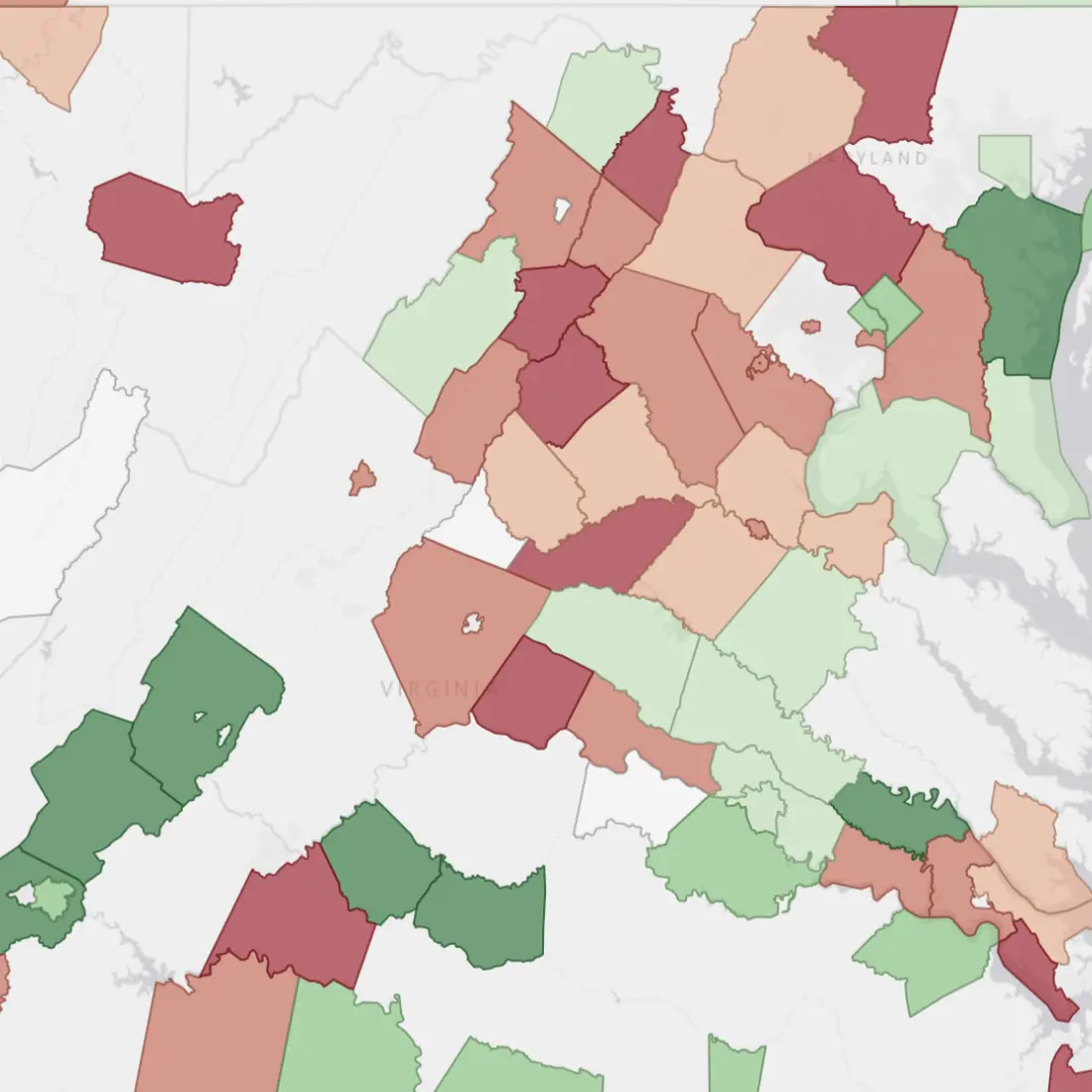 Screenshot of the data center community sentiment layer in PVcase Prospect over a map of Virginia and Maryland, showing the sentiment of each county towards data center in different tones of green (in favor) and red (against).