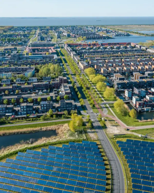 Aerial view of urban solar installations and surrounding infrastructure for project analysis.